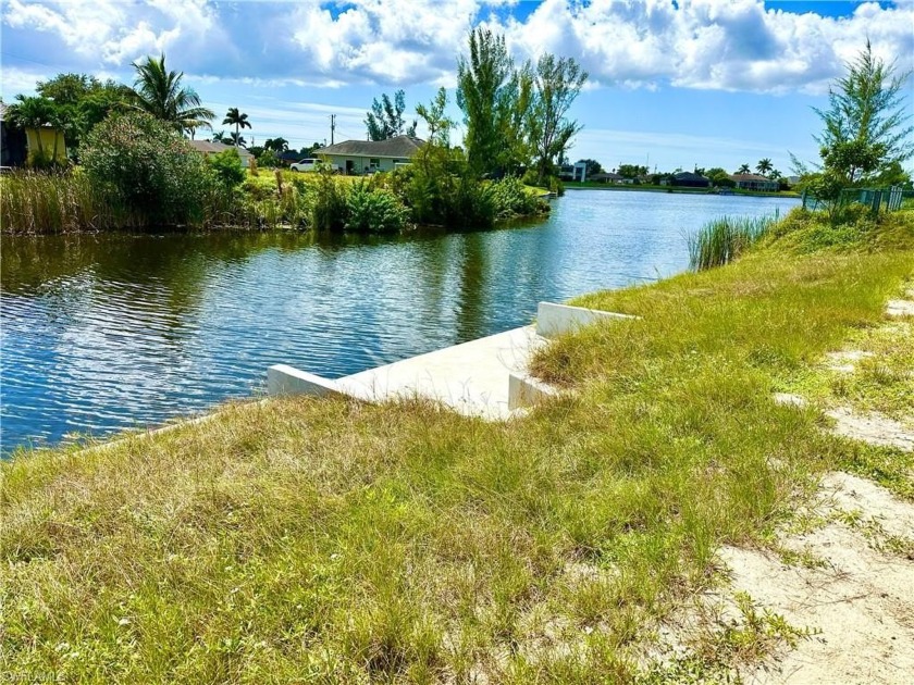 New seawall with concrete dock installed in 2025. Southern - Beach Lot for sale in Cape Coral, Florida on Beachhouse.com
