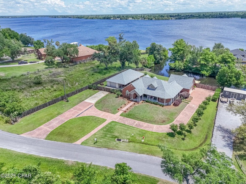 Lakefront Luxury with 6-Car Garage on Deer Point Lake!Welcome to - Beach Home for sale in Panama City, Florida on Beachhouse.com
