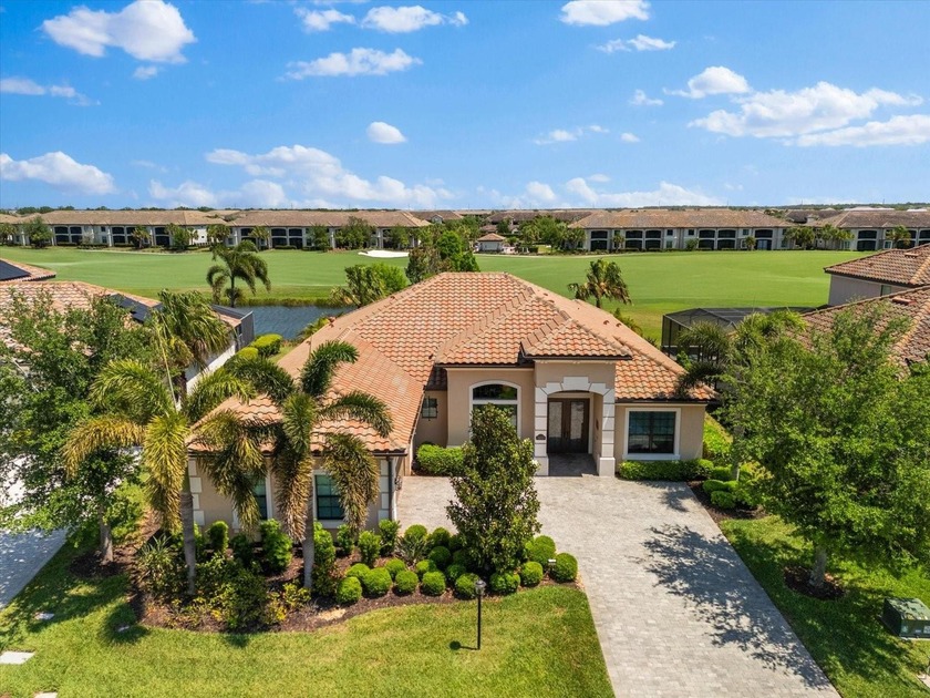 Welcome to the highly sought-after Lakewood National Golf Club - Beach Home for sale in Bradenton, Florida on Beachhouse.com