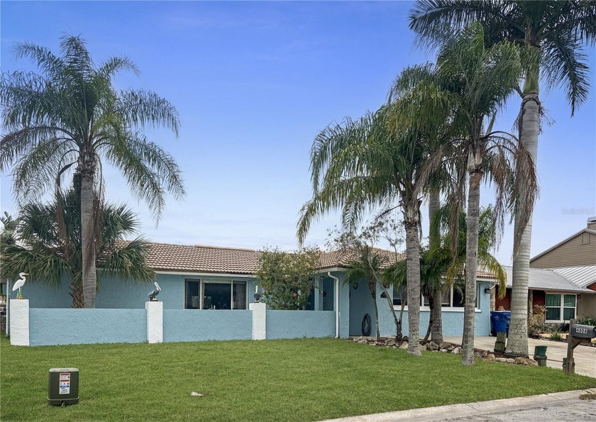 Must see beautiful waterfront pool home in the highly sought - Beach Home for sale in New Port Richey, Florida on Beachhouse.com