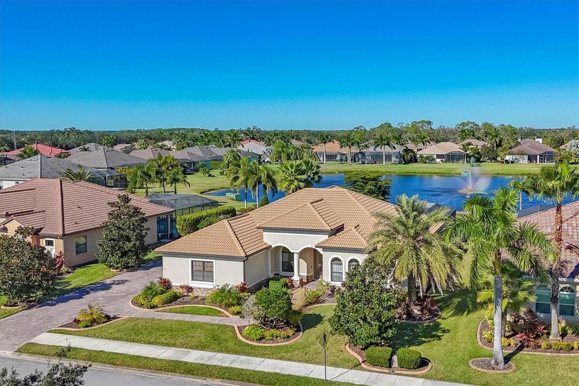 Discover this spacious 4-bedroom plus den/office, 3-bath pool - Beach Home for sale in Bradenton, Florida on Beachhouse.com