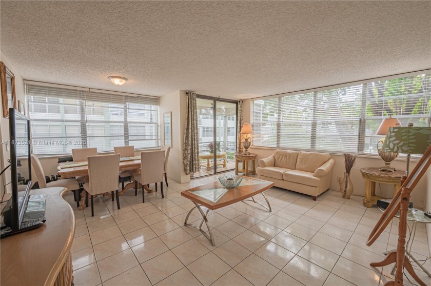 This corner unit offers an incredible opportunity to live in one - Beach Condo for sale in Hollywood, Florida on Beachhouse.com