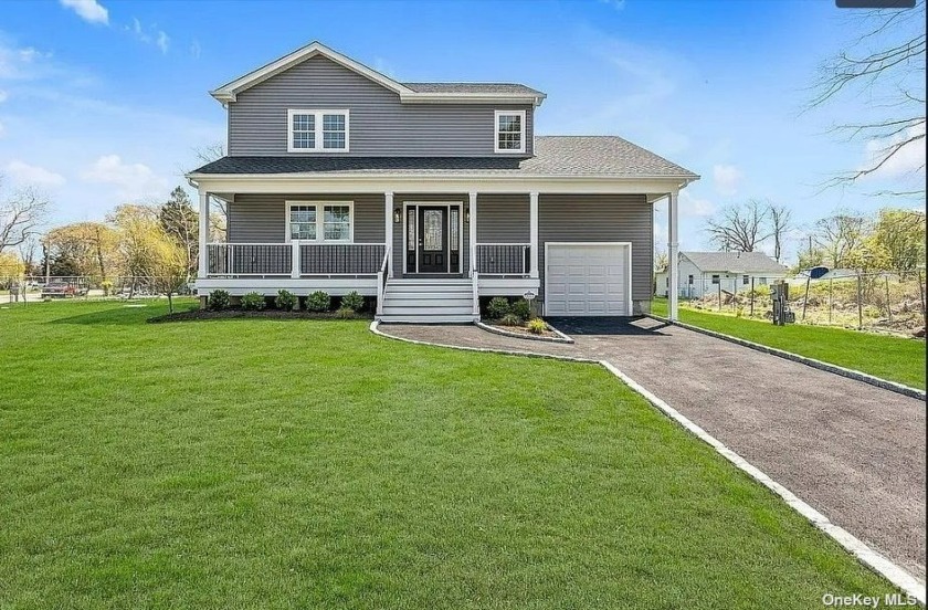 NEW CONSTRUCTION 2153 SQ. FT. 3 BEDROOM 3 BATH COLONIAL WITH A 1 - Beach Home for sale in Shirley, New York on Beachhouse.com