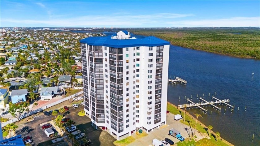 Discover the pinnacle of coastal living in this stunning Ocean - Beach Condo for sale in Fort Myers Beach, Florida on Beachhouse.com
