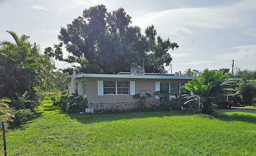 This adorable Tropical Gulf Acres property is looking for a new - Beach Home for sale in Punta Gorda, Florida on Beachhouse.com