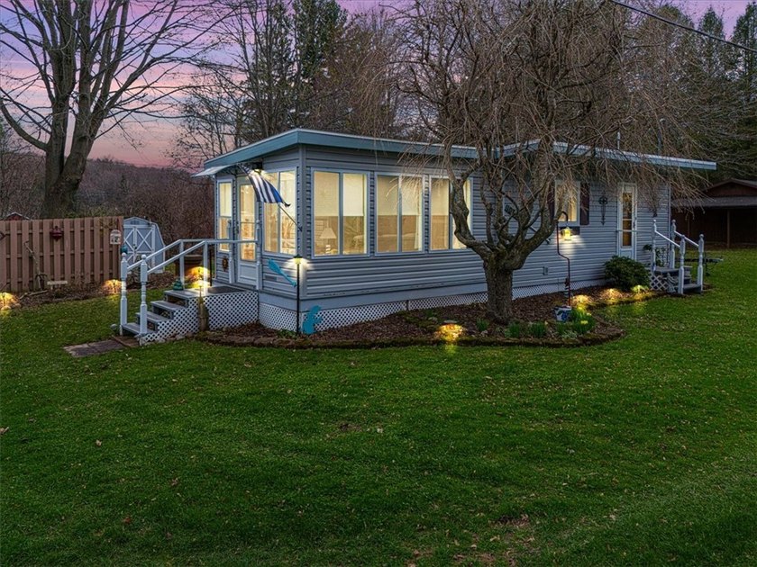 Welcome to 10340 Oregon Avenue on East Bay-a charming waterfront - Beach Home for sale in Wolcott, New York on Beachhouse.com
