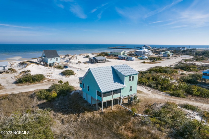 Where the road ends and the sun meets the Pamlico Sound, you - Beach Home for sale in Cedar Island, North Carolina on Beachhouse.com
