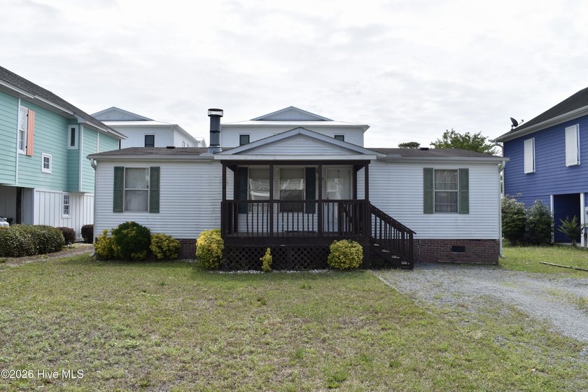 Just five blocks from the ocean, this doublewide manufactured - Beach Home for sale in Kure Beach, North Carolina on Beachhouse.com