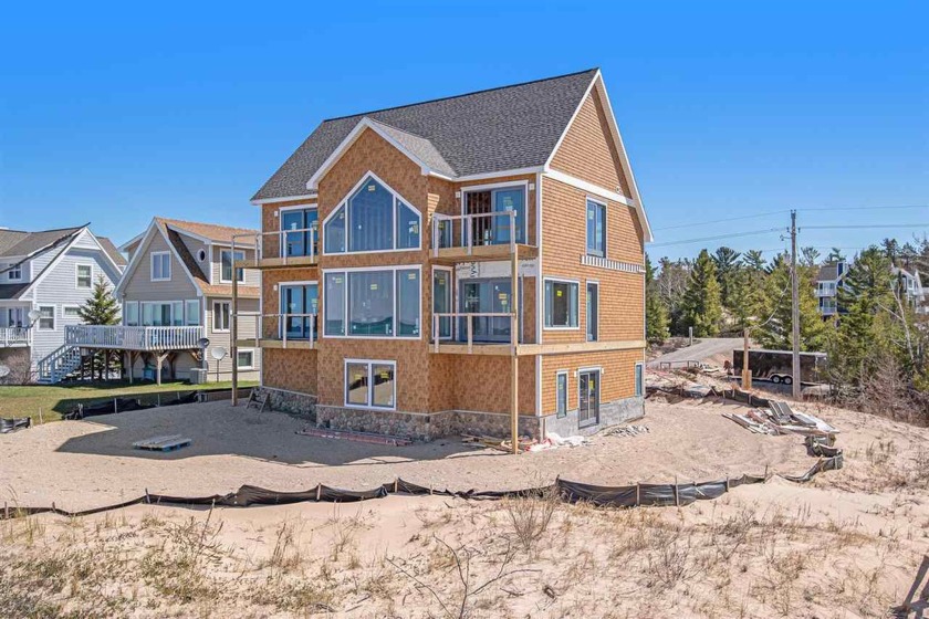 Discover your dream home on the shores of Lake Michigan, a - Beach Home for sale in Harbor Springs, Michigan on Beachhouse.com