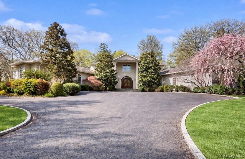 Tucked away on a serene private road just minutes from the - Beach Home for sale in Locust Valley, New York on Beachhouse.com