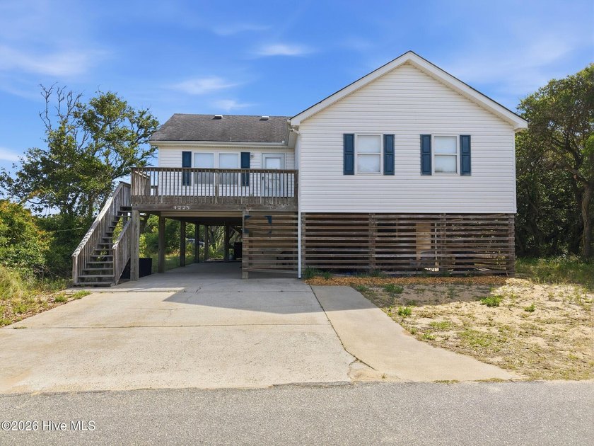 This coastal retreat offers the best of Outer Banks living with - Beach Home for sale in Kitty Hawk, North Carolina on Beachhouse.com