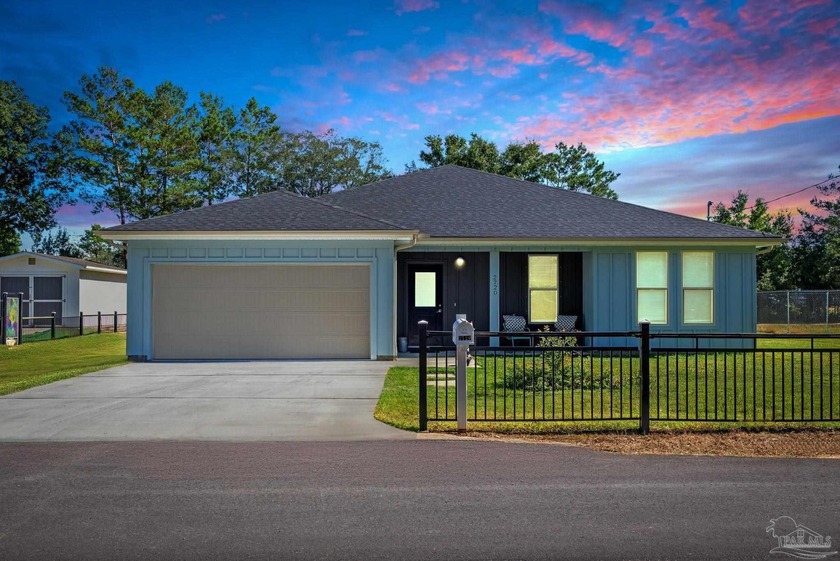 Built in 2025, this beautifully designed 4-bedroom, 2-bath home - Beach Home for sale in Navarre, Florida on Beachhouse.com