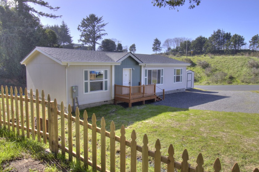 This brand new 3-bedroom, 2-bathroom home on almost a quarter - Beach Home for sale in Gold Beach, Oregon on Beachhouse.com