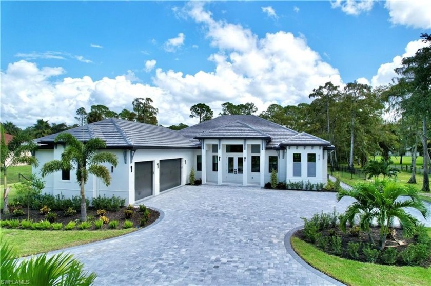 Step into modern coastal elegance with this newly built - Beach Home for sale in Naples, Florida on Beachhouse.com