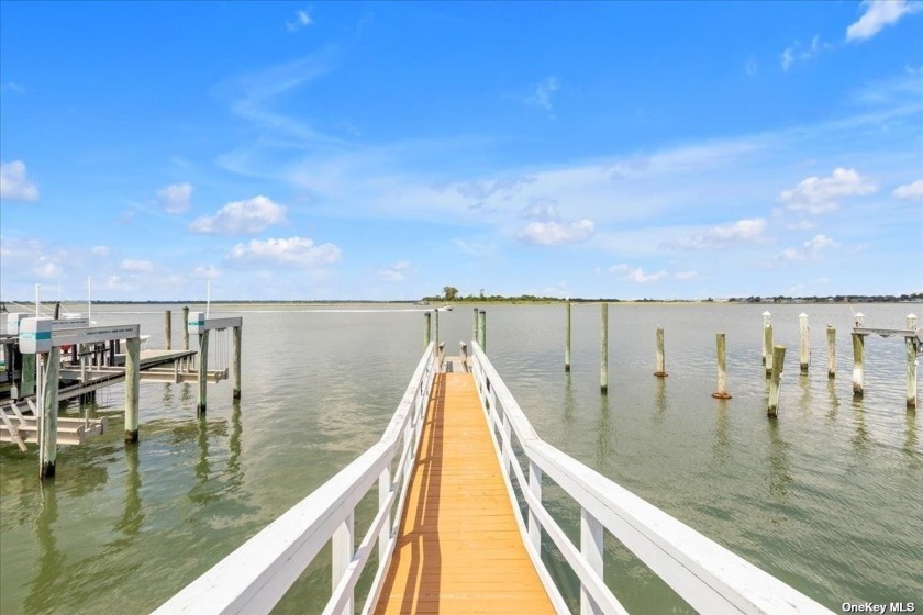 Welcome to an extraordinary waterfront home that masterfully - Beach Home for sale in Long Beach, New York on Beachhouse.com