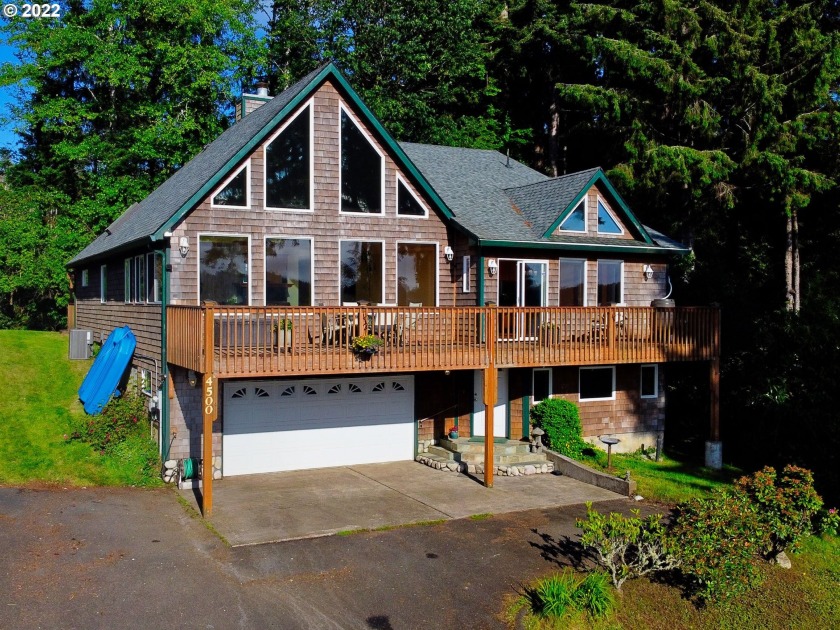 Imagine sipping your morning coffee from an expansive deck with - Beach Home for sale in Otis, Oregon on Beachhouse.com