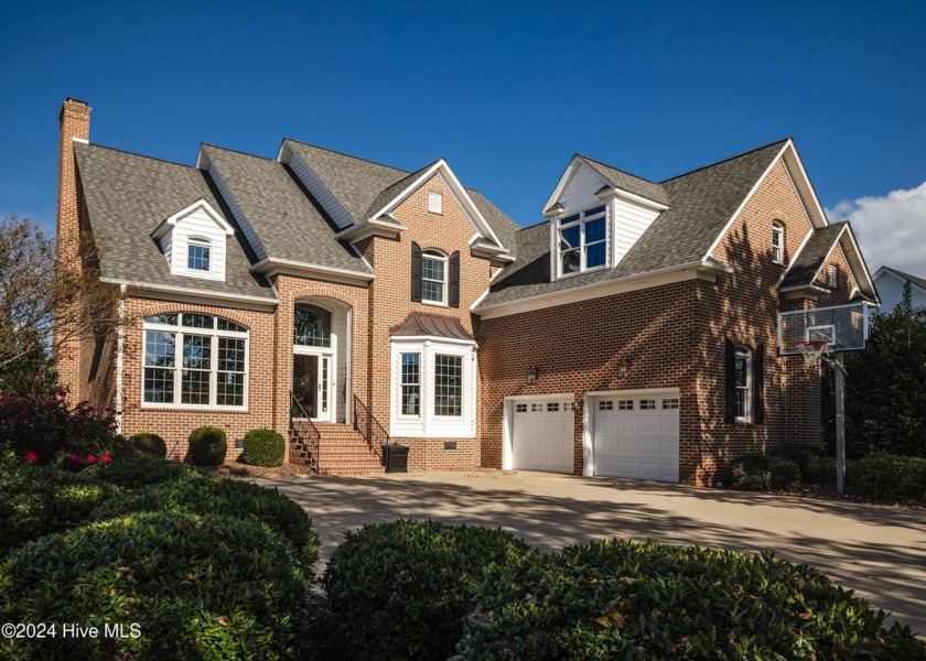 This custom lake front brick home is in Edenton Lake & Harbor - Beach Home for sale in Edenton, North Carolina on Beachhouse.com