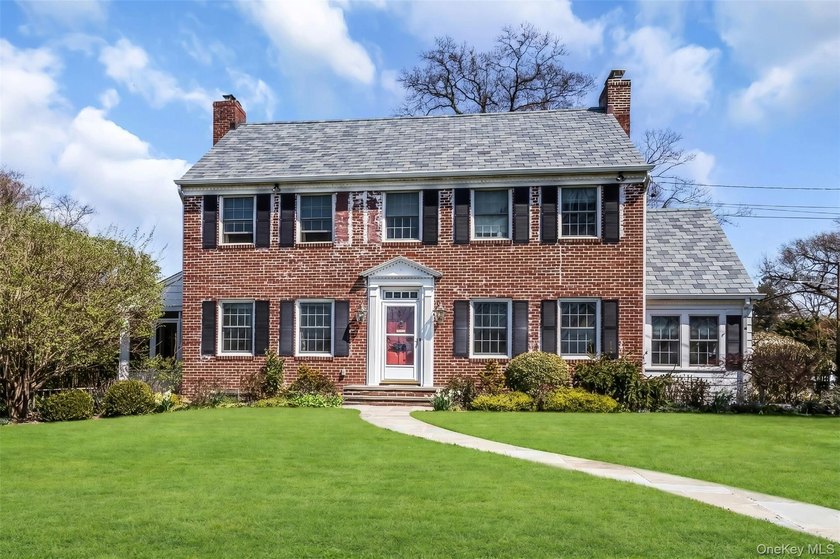 Welcome to this beautifully maintained brick Center Hall - Beach Home for sale in Oceanside, New York on Beachhouse.com