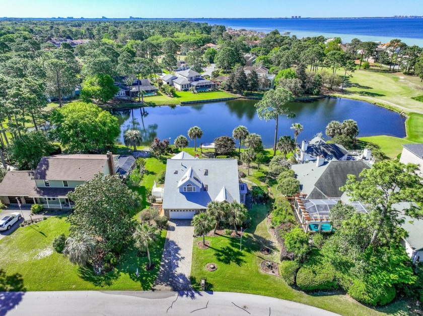 LAKEFRONT LIVING IN GATED SOUTHWIND - ROOM TO UPDATE, VIEWS TO - Beach Home for sale in Niceville, Florida on Beachhouse.com