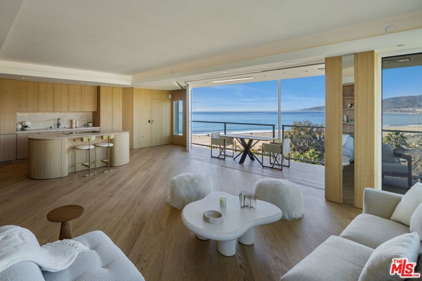 Prepare to experience the pinnacle of coastal luxury in this - Beach Condo for sale in Santa Monica, California on Beachhouse.com