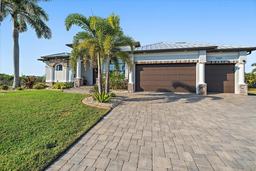 Welcome to this exquisite custom home on a double lot in South - Beach Home for sale in Port Charlotte, Florida on Beachhouse.com
