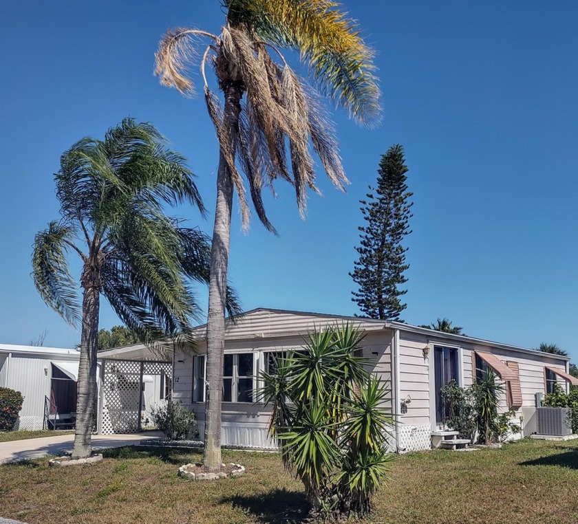 This lovely two bedroom two bathroom manufactured home in the 55 - Beach Home for sale in Port Saint Lucie, Florida on Beachhouse.com