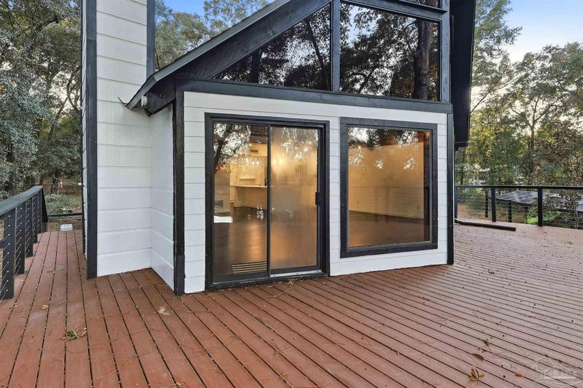 Discover the Pinnacle of Multi-Generational Lakefront Living! - Beach Home for sale in Milton, Florida on Beachhouse.com