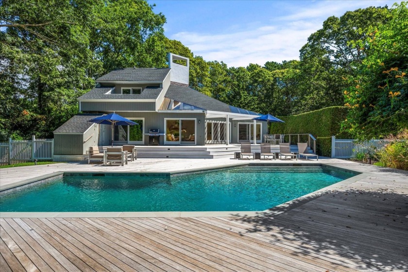 This sun-filled contemporary home situated on a private 1 +/- - Beach Home for sale in Quogue, New York on Beachhouse.com