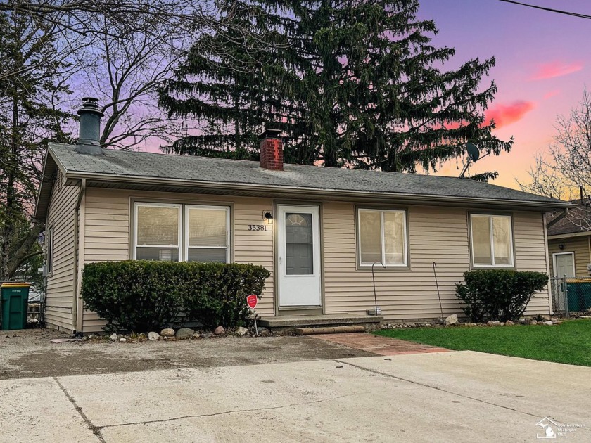 Tucked away on a peaceful dead-end street, this beautifully - Beach Home for sale in Rockwood, Michigan on Beachhouse.com