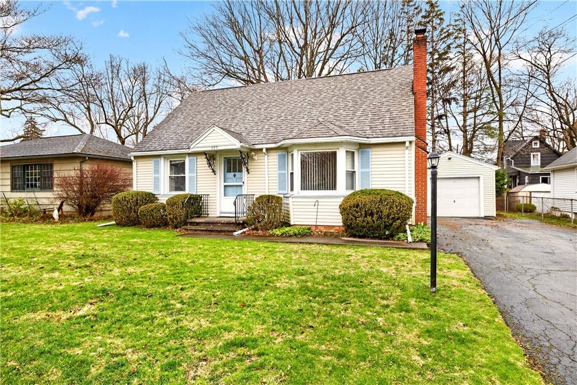 Located in Irondequoit just minutes from the shoreline, this - Beach Home for sale in Irondequoit, New York on Beachhouse.com