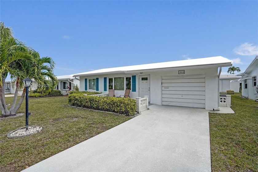 Step into comfort and convenience with this charming and - Beach Home for sale in Boynton Beach, Florida on Beachhouse.com