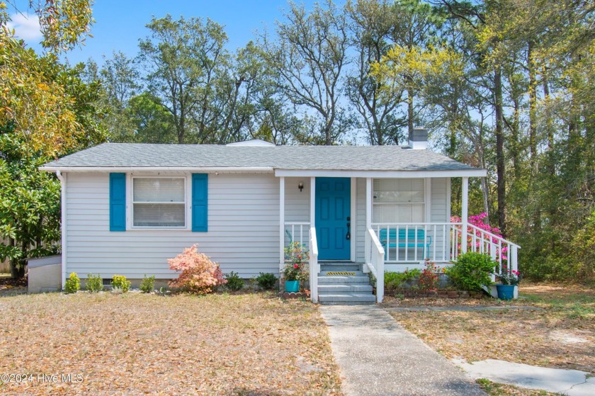 Experience coastal living at its finest just a short stroll away - Beach Home for sale in Oak Island, North Carolina on Beachhouse.com