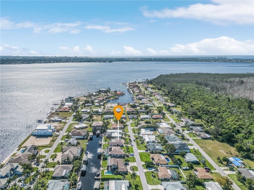 Sailboat access, four bedroom, three bath home tucked away in a - Beach Home for sale in Cape Coral, Florida on Beachhouse.com
