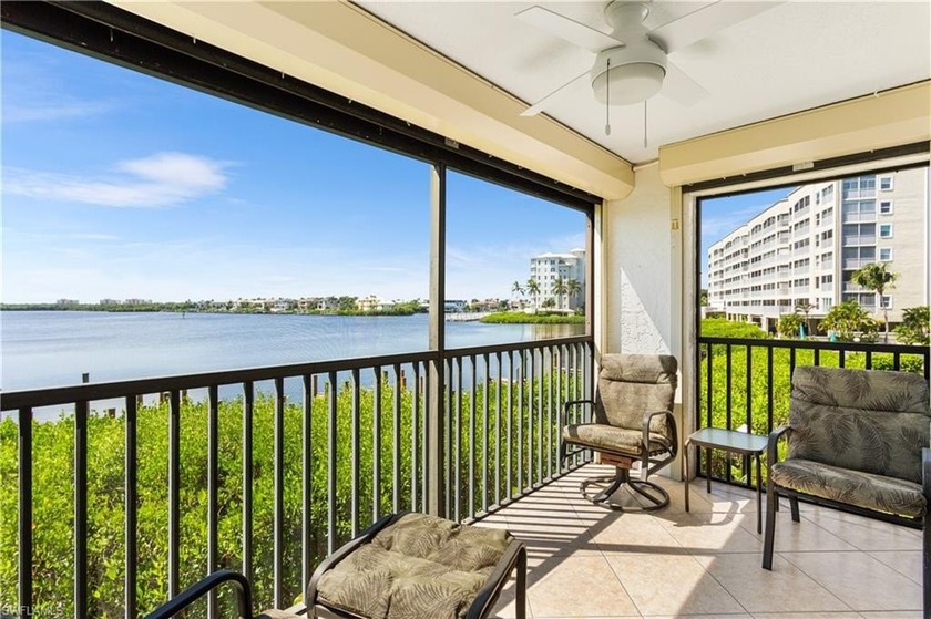 YOUR  BAYSIDE COTTAGE AWAITS...STUNNING BAY VIEWS...STUNNING - Beach Condo for sale in Bonita Springs, Florida on Beachhouse.com