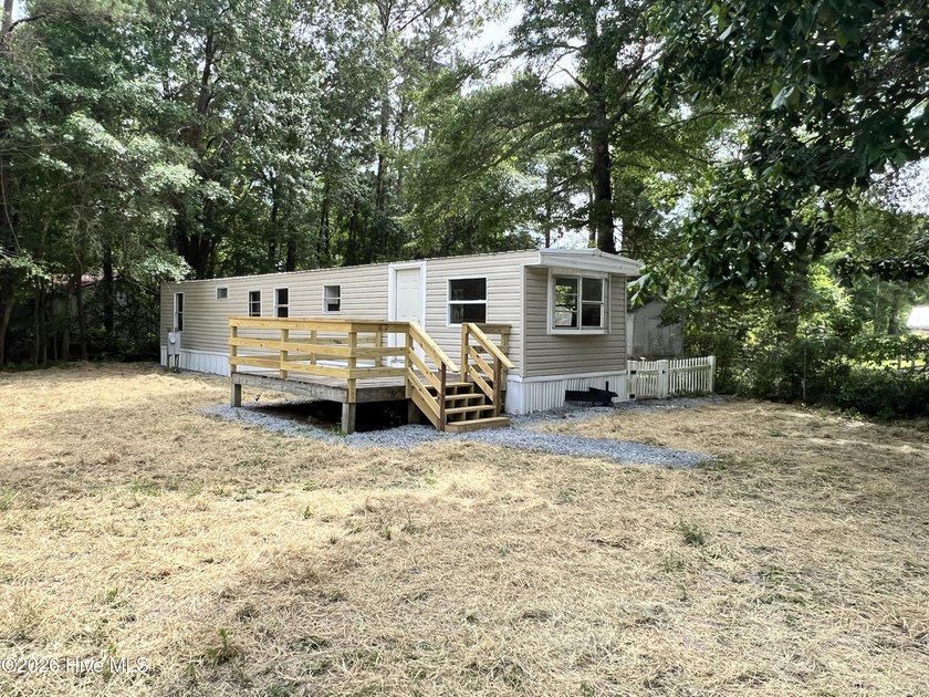 NO HOA - YOU OWN THE LAND! Just 15 minutes to Holden Beach. Skip - Beach Home for sale in Shallotte, North Carolina on Beachhouse.com