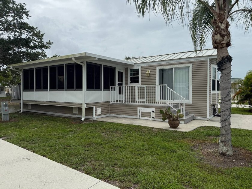 This is a darling 2006-built home with a fairly large porch - Beach Home for sale in Naples, Florida on Beachhouse.com