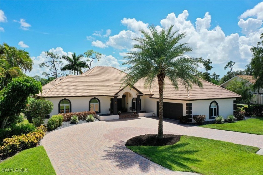 This delightful 3-bedroom, 3-bath home with a spectacular den - Beach Home for sale in Fort Myers, Florida on Beachhouse.com