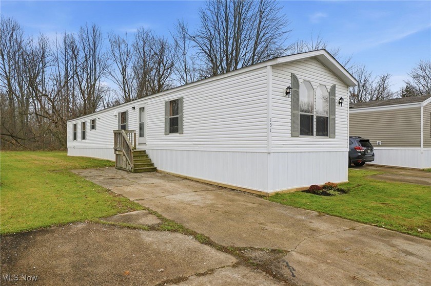 This well-maintained home in Austin Woods offers several recent - Beach Home for sale in Geneva, Ohio on Beachhouse.com