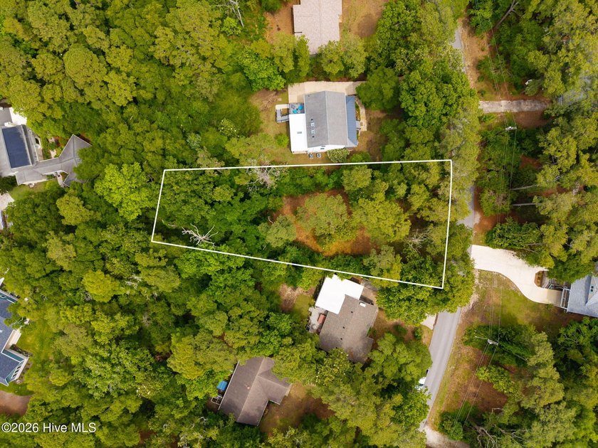 Nestled between the Atlantic Ocean and Bogue Sound, this highly - Beach Lot for sale in Pine Knoll Shores, North Carolina on Beachhouse.com