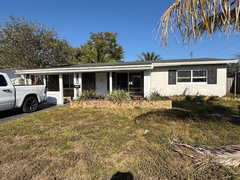 3 Bed 2 Bath plus a Den single-family home in a very desirable - Beach Home for sale in Dania, Florida on Beachhouse.com