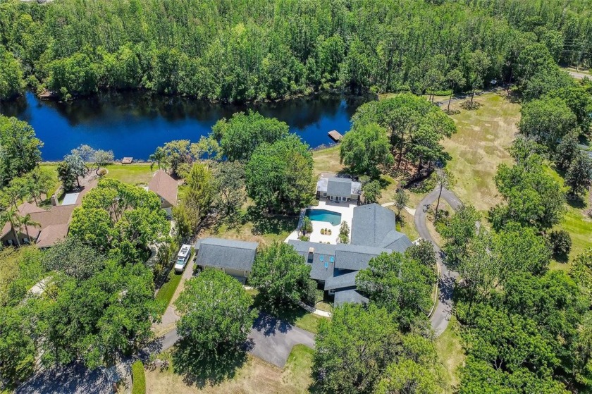 Perched high above sea level, this rare and secluded property is - Beach Home for sale in Tarpon Springs, Florida on Beachhouse.com