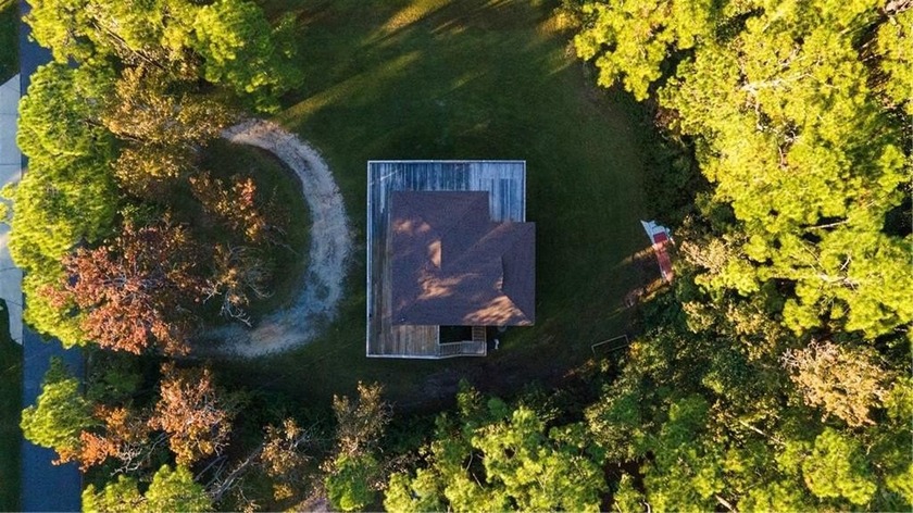 This charming elevated island cottage is the perfect blend of - Beach Home for sale in Dauphin Island, Alabama on Beachhouse.com