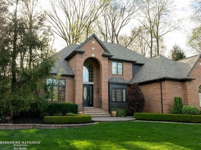 Welcome to this exceptional custom-built estate in the highly - Beach Home for sale in Shelby, Michigan on Beachhouse.com