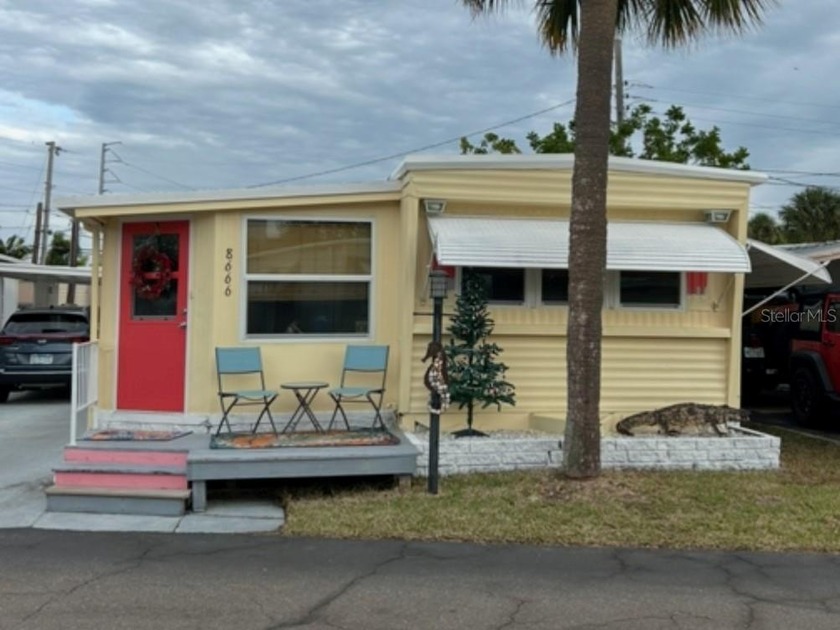 Located in the heart of Jungle Terrace, this 2-bedroom, 1.5-bath - Beach Home for sale in St. Petersburg, Florida on Beachhouse.com