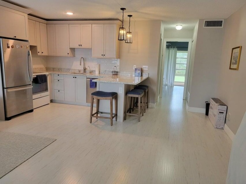 A FABULOUS, IMPECCIBLE FULLY UPDATED, OPEN AND SPACIOUS 1 - Beach Condo for sale in Stuart, Florida on Beachhouse.com