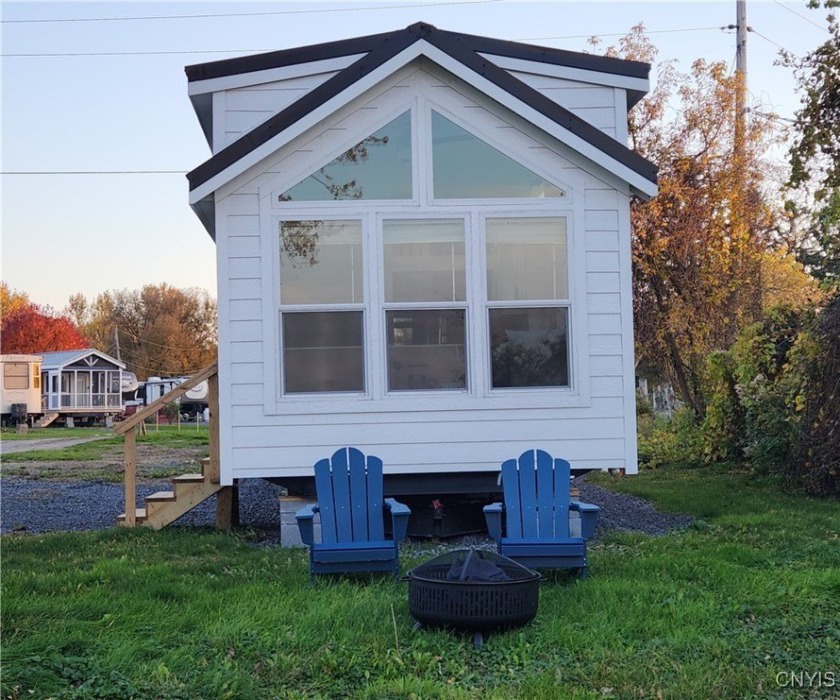 Experience this new, turnkey mobile lakeside retreat, located on - Beach Home for sale in Henderson, New York on Beachhouse.com