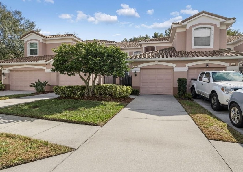 Tucked away in the CENTRALLY LOCATED GATED COMMUNITY OF COACHMAN - Beach Condo for sale in Clearwater, Florida on Beachhouse.com