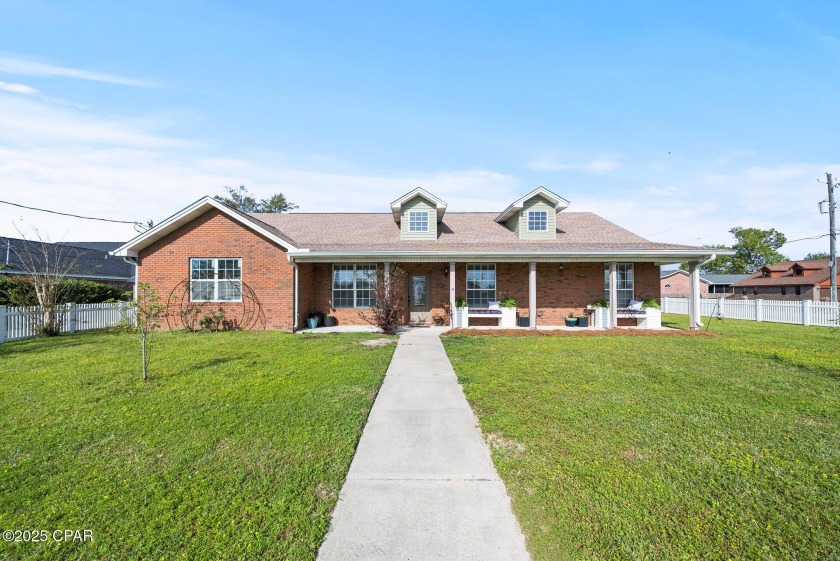 Always dreamed of a home with a white picket fence? This corner - Beach Home for sale in Lynn Haven, Florida on Beachhouse.com