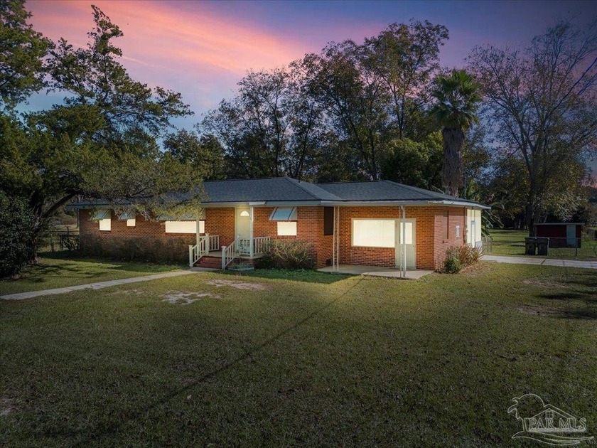 Discover a truly unique opportunity on this expansive corner lot - Beach Home for sale in Pensacola, Florida on Beachhouse.com