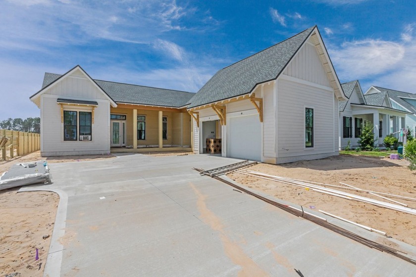 Discover refined coastal living in this stunning Hampton plan by - Beach Home for sale in Watersound Beach, Florida on Beachhouse.com
